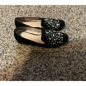 Unisa bedazzled loafers.